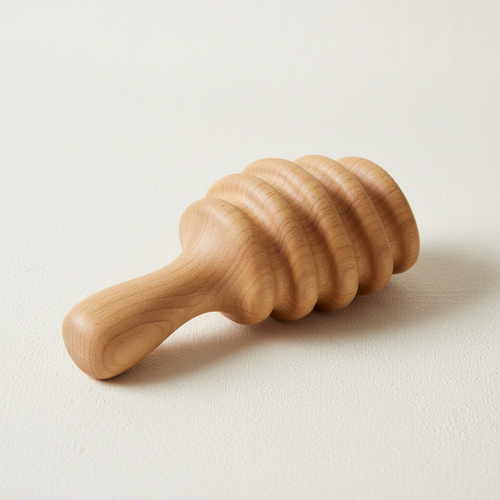 Wooden Lymphatic Drainage Massager on cream background